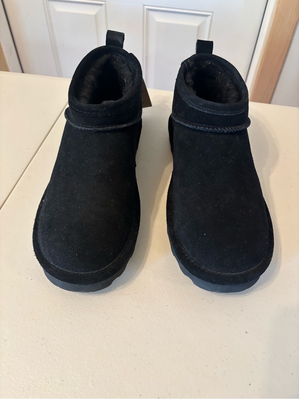 BearPaw women’s Black Suede Fleece-Lined Ankle Booties